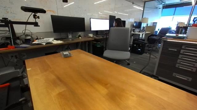 The same table with the objects inpainted away